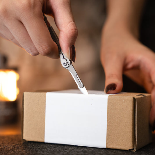 CT9 Titanium Utility Knife with opener